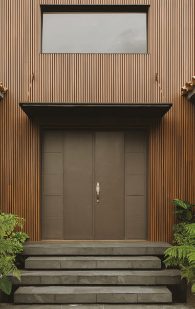 Paneles madera acústica fachada exterior en Manzano Cáceres